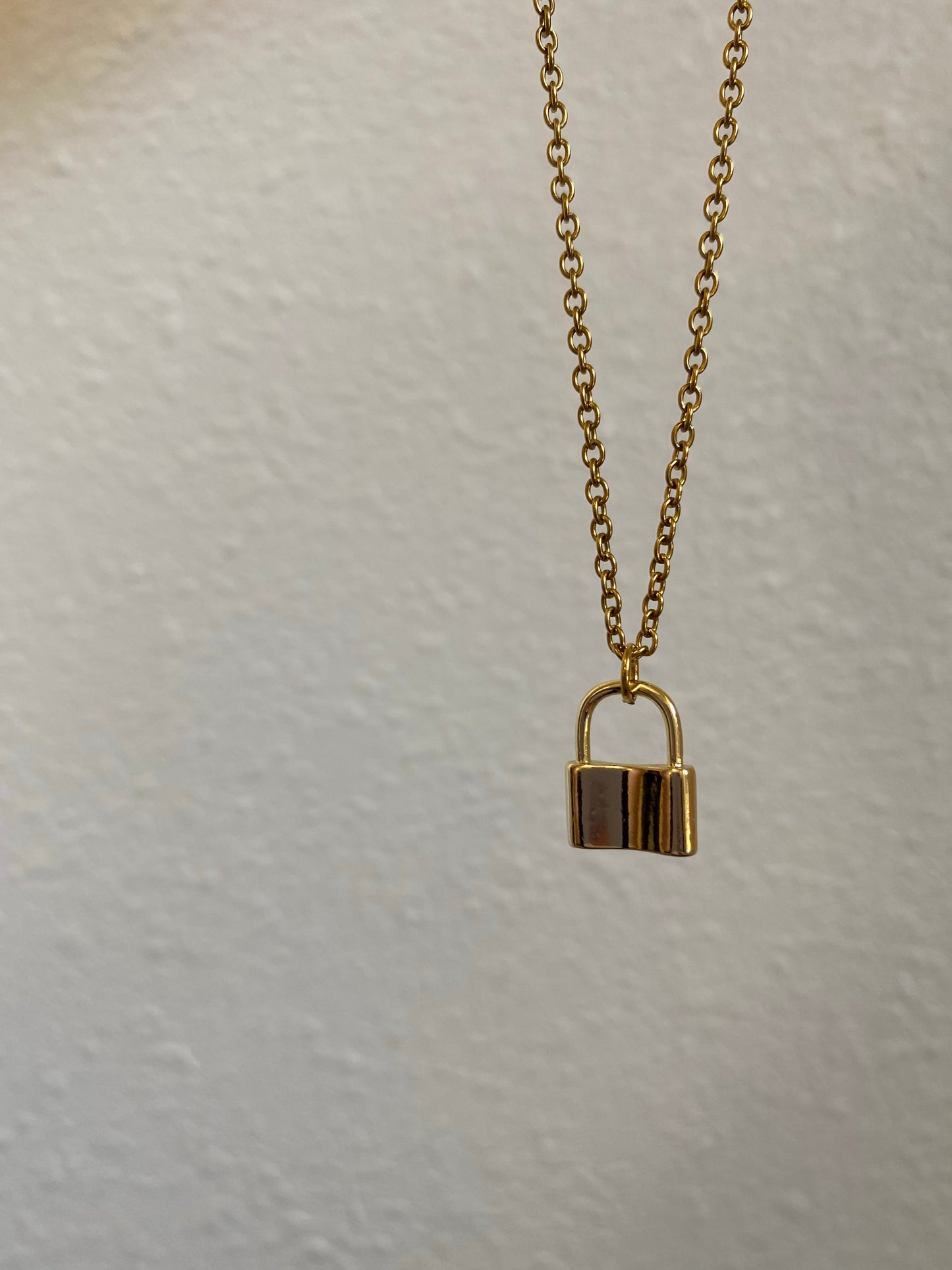 Gold lock necklace