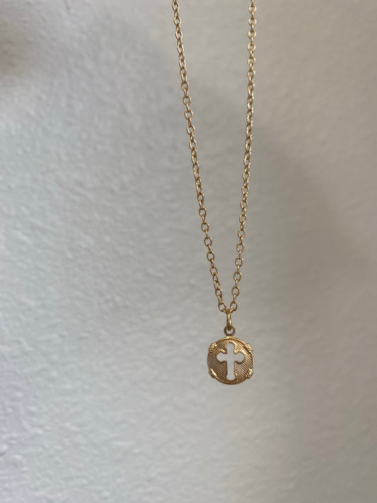 Tiny cross medal